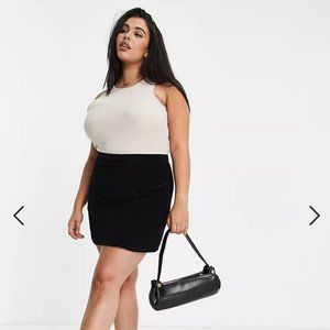 ASOS DESIGN Curve high waist mini skirt in black cord